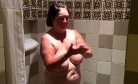 chubby-brunette-granny-flaunts-her-sexy-body-in-the-shower
