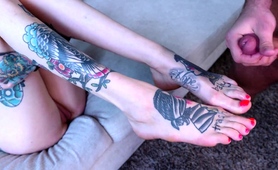 inked-babe-rides-a-cock-and-gets-her-feet-sprayed-with-cum